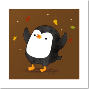 Penguin having fun with autumn leaves Posters and Art